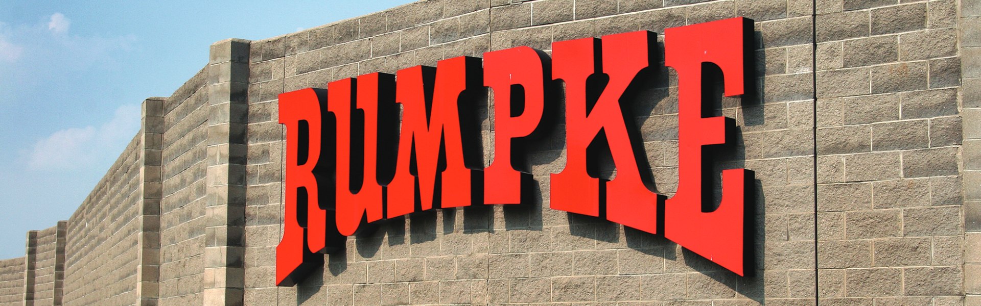 Rumpke Waste And Recycling Red Logo On Outside Wall